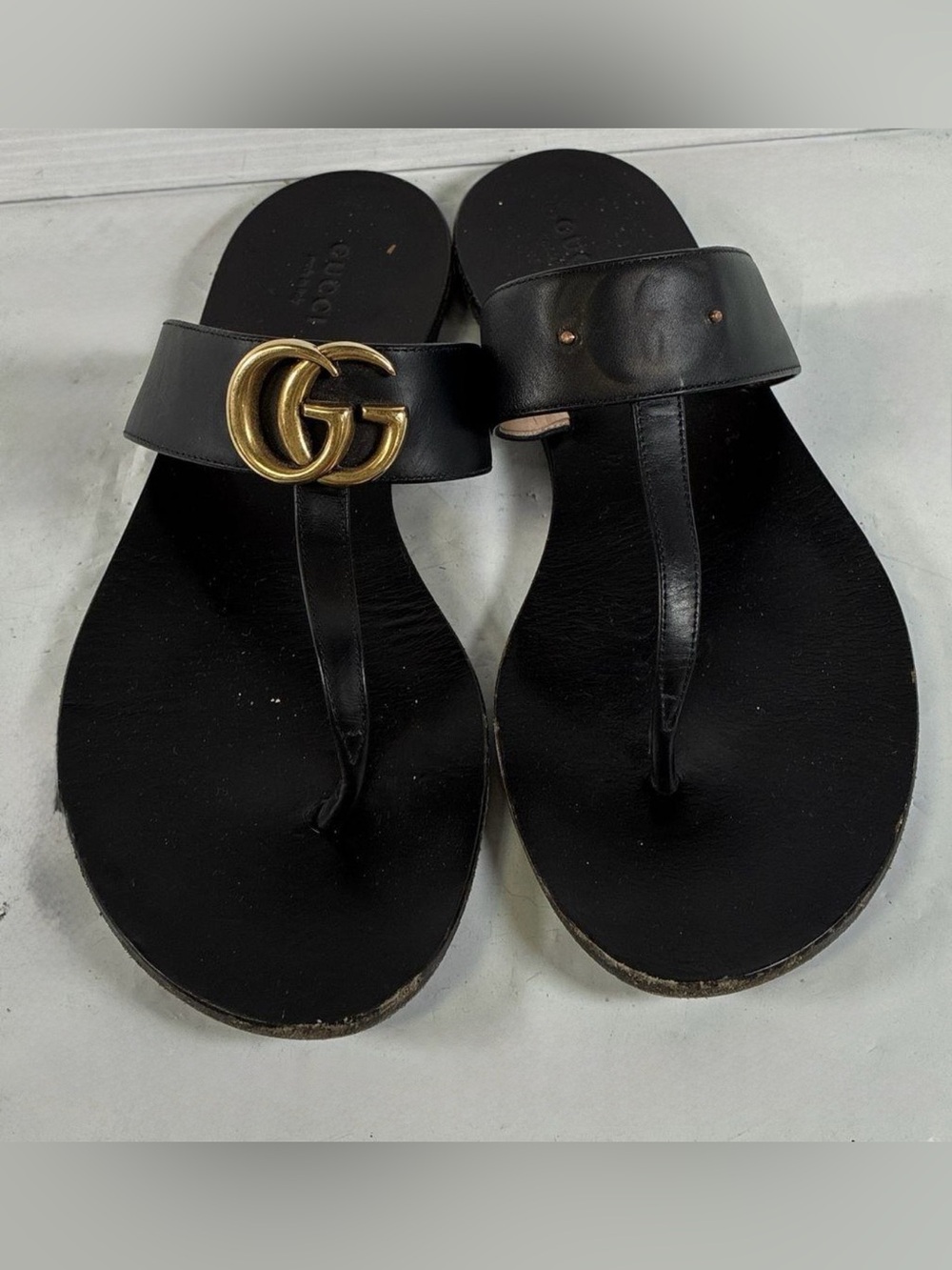 Gucci Black Leather GG Thong Sandals with Gold Logo